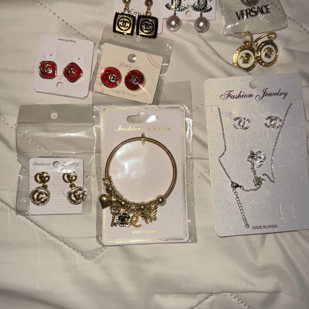 Entire lot. Sold as a package. Chanel Versace etc.